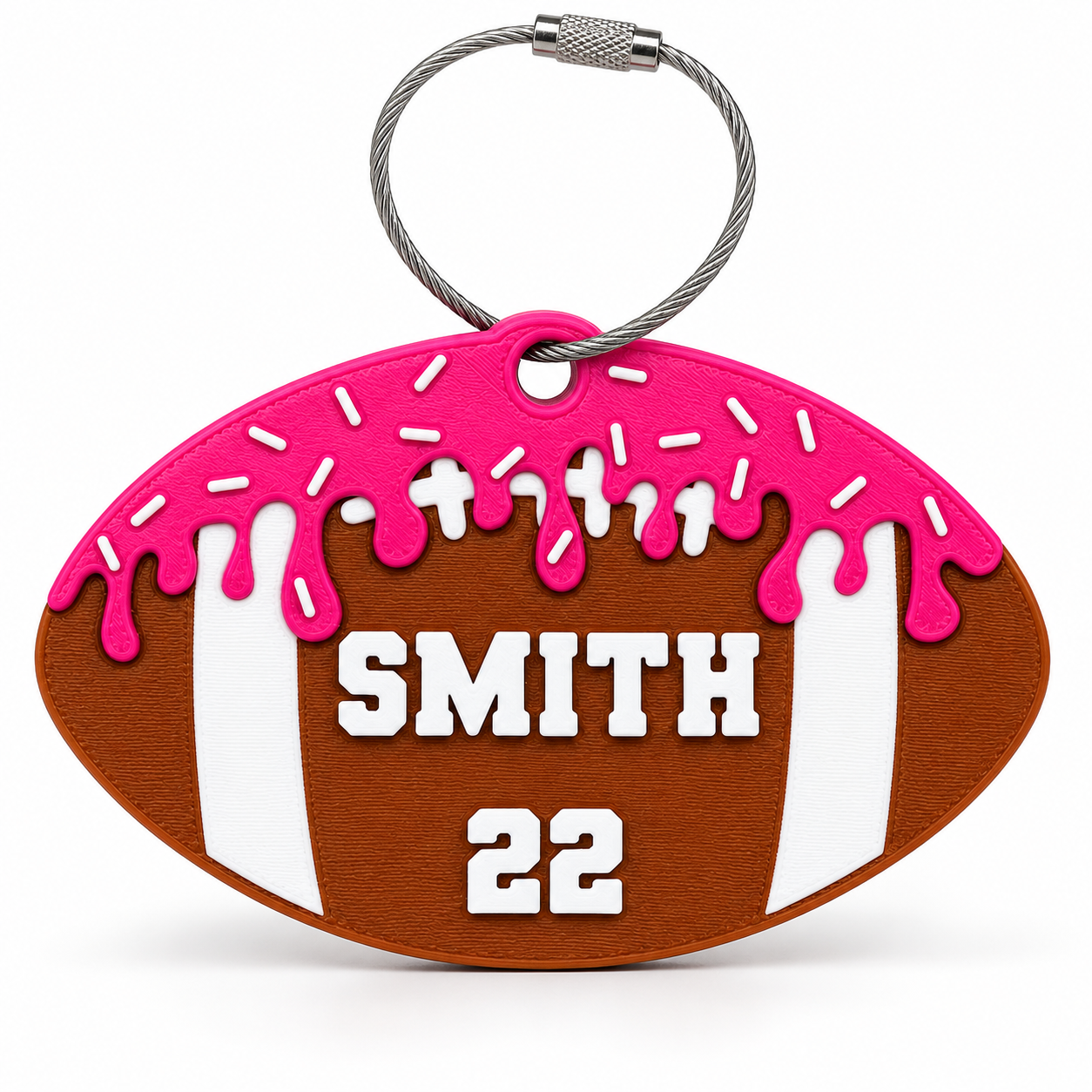 Football bag tag sports keychain — pink drip icing, SMITH 22, wire loop — real product photo